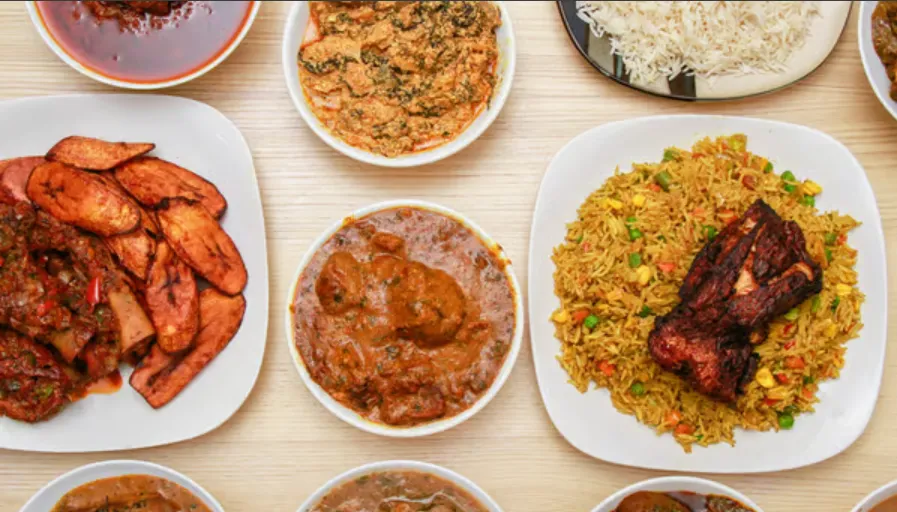 Lochi Afro Nija signature Nigerian dishes - Jollof Rice and Egusi Soup in Edmonton