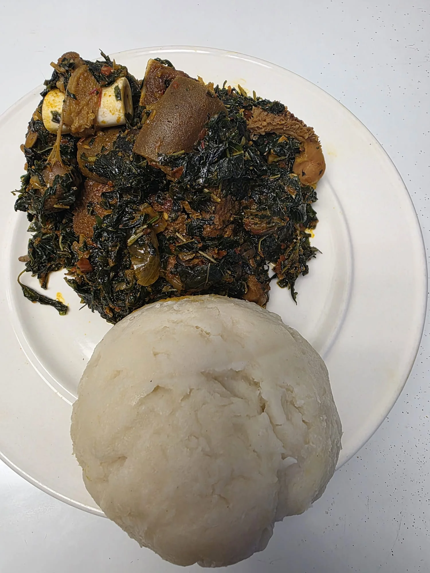 Delicious Efo Riro with Pounded Yam at Lochi Afro Nija Nigerian Restaurant in Edmonton, AB